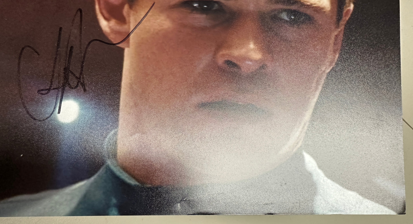 
                  
                    Chris Hemsworth as George Kirk in Star Trek Signed 8x10 Photo
                  
                