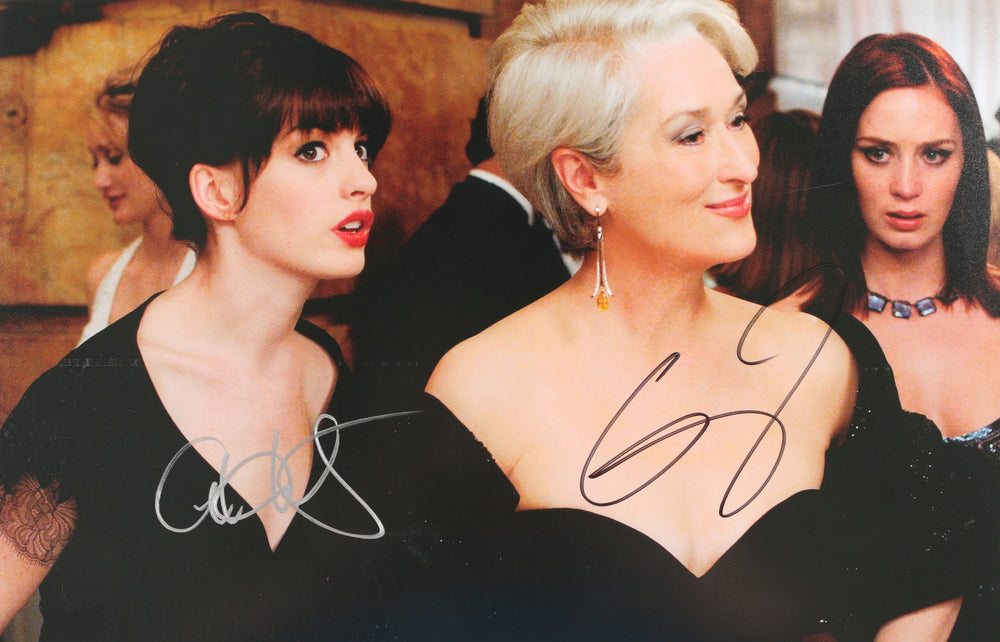 Anne Hathaway as Andrea Sachs & Emily Blunt as Emily Charlton in The Devil Wears Prada Signed 11x17 Photo