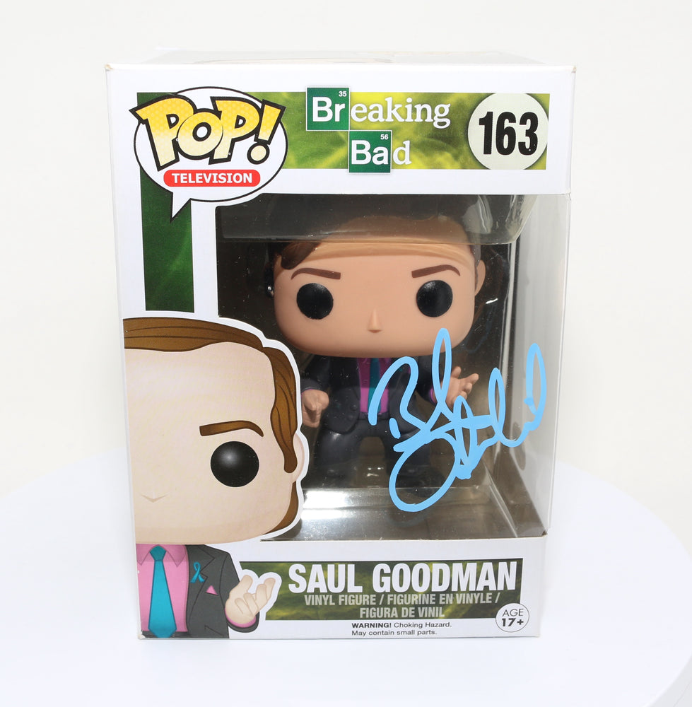 
                  
                    Bob Odenkirk as Saul Goodman from Breaking Bad/Better Call Saul (Autopgraph COA) Signed Funko POP! #163
                  
                
