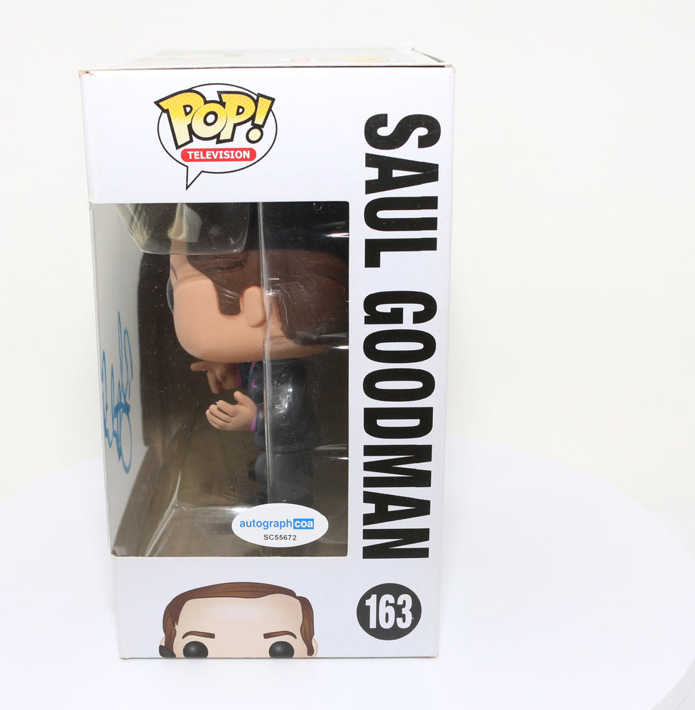 
                  
                    Bob Odenkirk as Saul Goodman from Breaking Bad/Better Call Saul (Autopgraph COA) Signed Funko POP! #163
                  
                