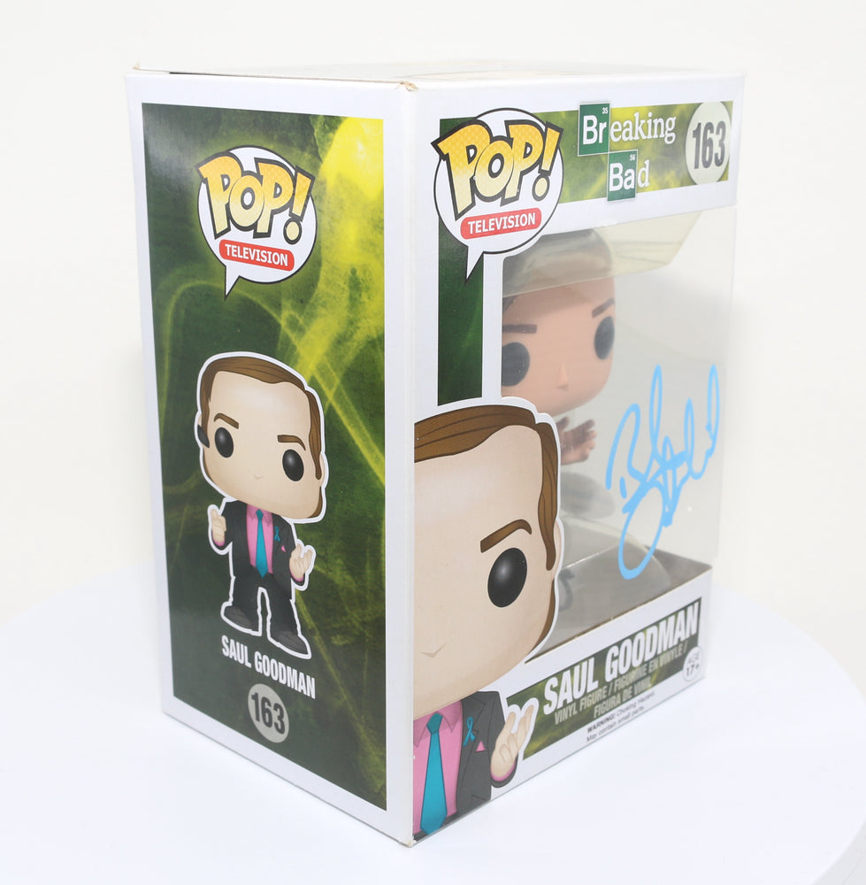 
                  
                    Bob Odenkirk as Saul Goodman from Breaking Bad/Better Call Saul (Autopgraph COA) Signed Funko POP! #163
                  
                
