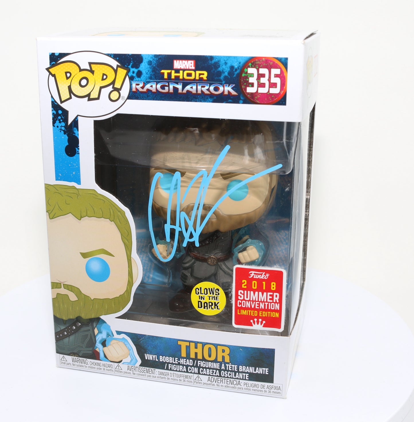 
                  
                    Chris Hemsworth as Thor in Thor: Ragnarok 2018 Summer Convention Glow in the Dark Exclusive (SWAU) Signed Funko POP! #335
                  
                