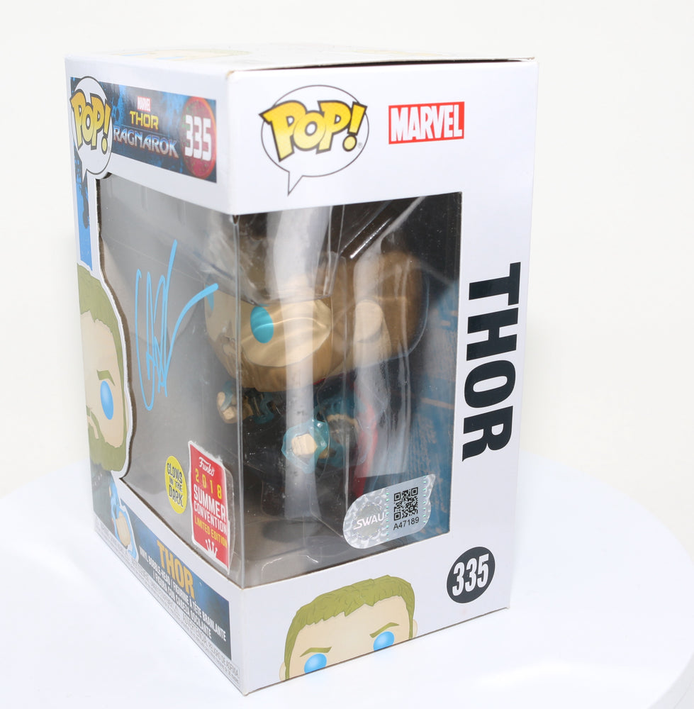 
                  
                    Chris Hemsworth as Thor in Thor: Ragnarok 2018 Summer Convention Glow in the Dark Exclusive (SWAU) Signed Funko POP! #335
                  
                