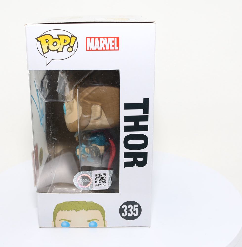 
                  
                    Chris Hemsworth as Thor in Thor: Ragnarok 2018 Summer Convention Glow in the Dark Exclusive (SWAU) Signed Funko POP! #335
                  
                