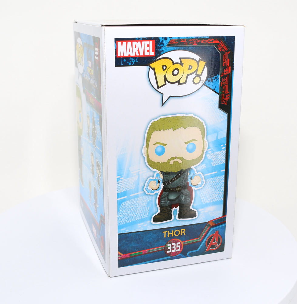 
                  
                    Chris Hemsworth as Thor in Thor: Ragnarok 2018 Summer Convention Glow in the Dark Exclusive (SWAU) Signed Funko POP! #335
                  
                