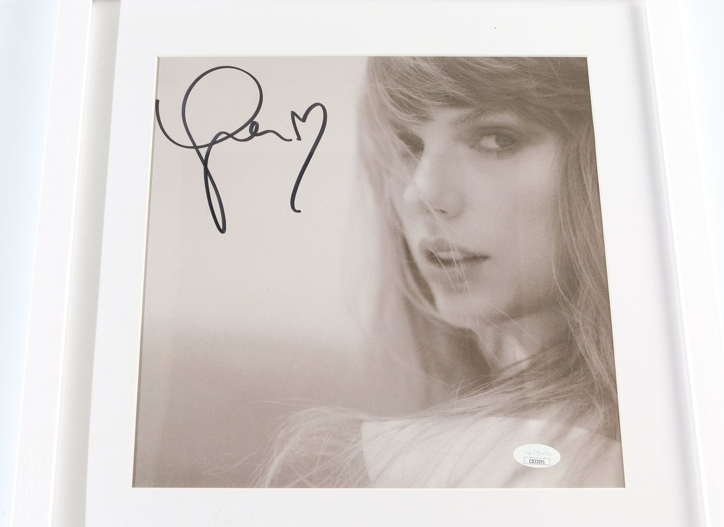 
                  
                    The Tortured Poets Department Framed LP 12" Vinyl Record Insert (JSA) Signed by Taylor Swift
                  
                