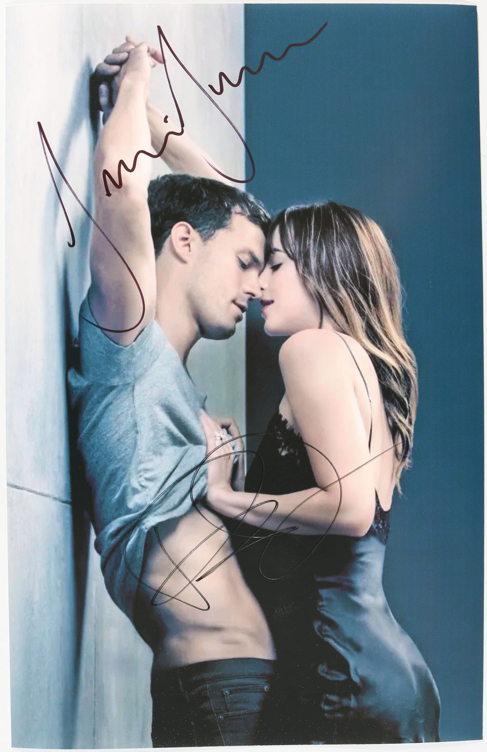 Jamie Dornan as Christian Grey & Dakota Johnson as Anastasia Steele in Fifty Shades of Grey Signed 11x17 Photo