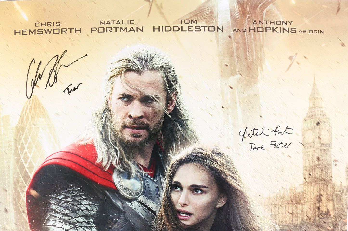 
                  
                    Chris Hemsworth as Thor & Natalie Portman as Jane Foster in Thor: The Dark World (SWAU) Signed 27x40 Poster with Character Names
                  
                