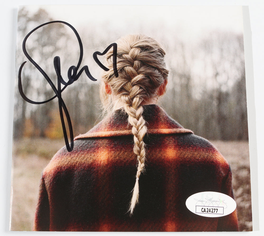 
                  
                    Evermore CD Album with Cover (JSA) Signed by Taylor Swift
                  
                