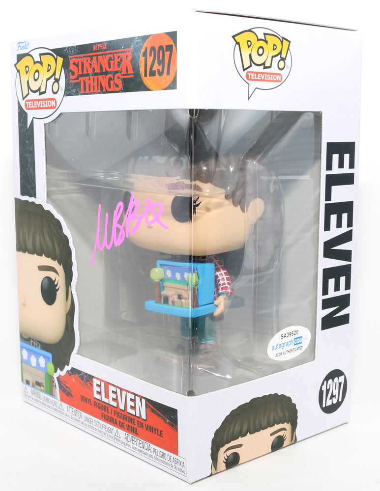 
                  
                    Millie Bobby Brown as Eleven in Stranger Things (ACOA) Signed Funko POP! #1297
                  
                