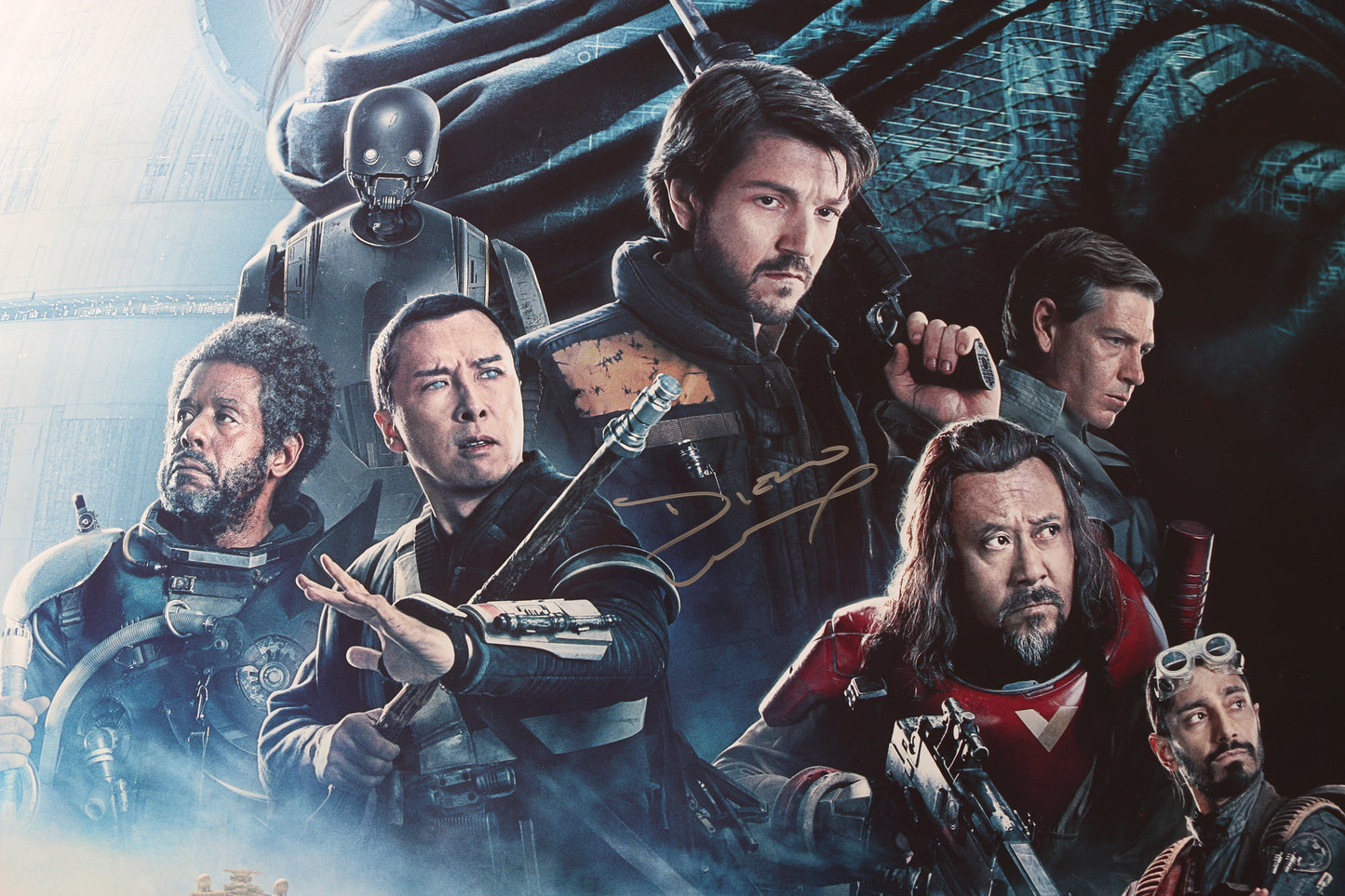 
                  
                    Diego Luna as Cassian Andor & Felicity Jones as Jyn Erso in Rogue One: A Star Wars Story (SWAU) Signed 27x40 Poster
                  
                