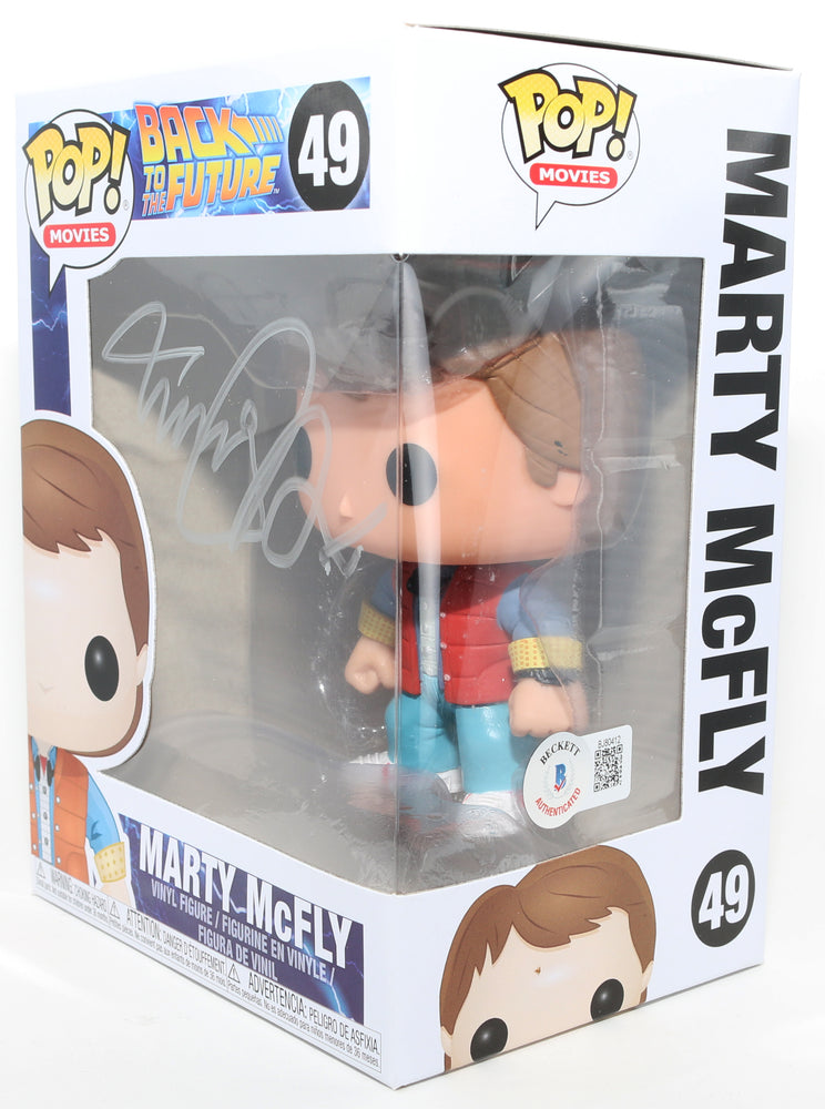 
                  
                    Michael J. Fox as Marty McFly in Back to the Future (Beckett) Signed Funko POP! #49
                  
                