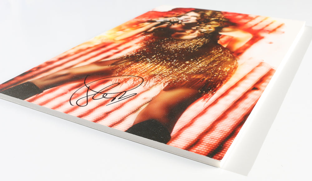 
                  
                    Taylor Swift Singer-Songwriter in Concert Signed 9x12 Photo
                  
                