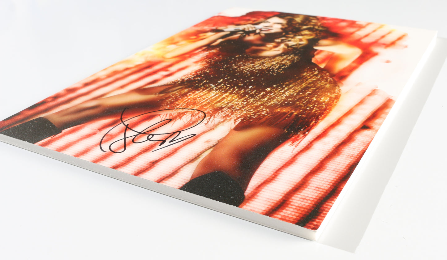 
                  
                    Taylor Swift Singer-Songwriter in Concert Signed 9x12 Photo
                  
                