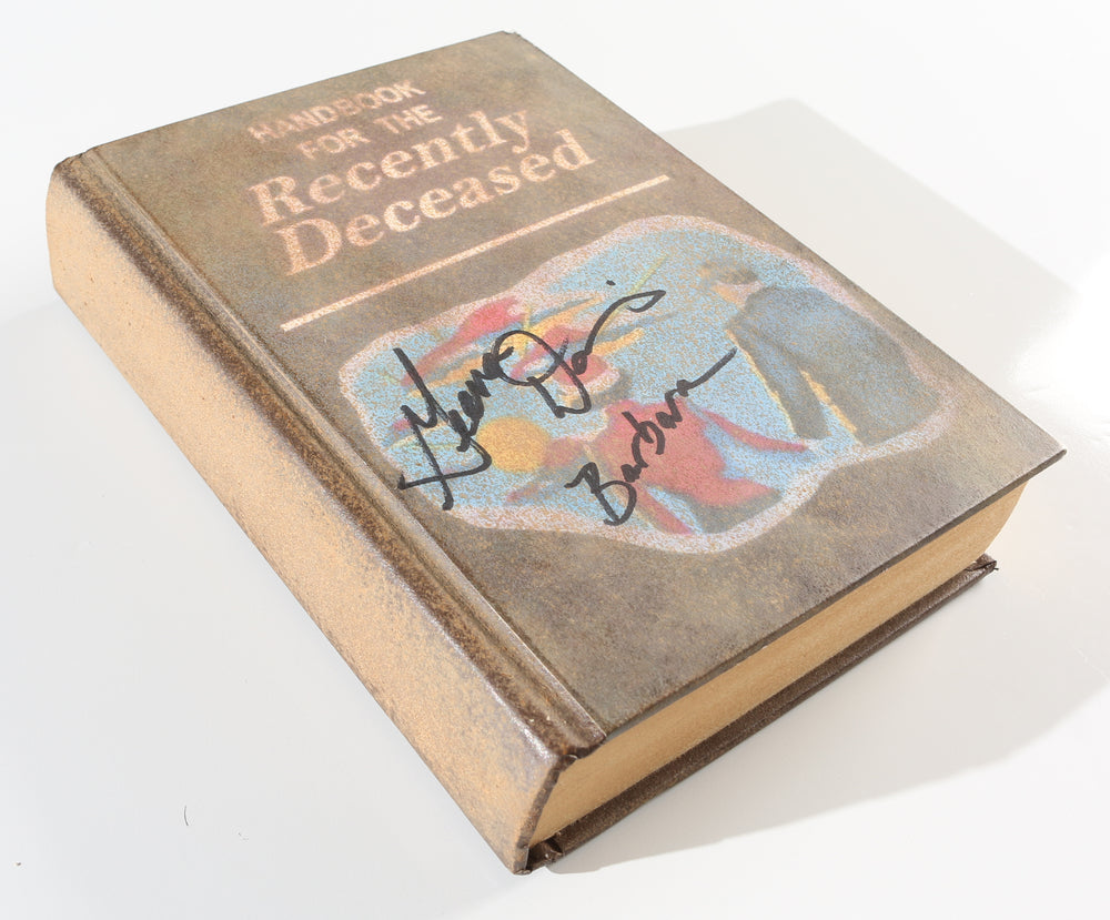 
                  
                    Geena Davis as Barbara Maitland in Tim Burton's Beetlejuice Signed Prop Replica Handbook for the Recently Deceased
                  
                
