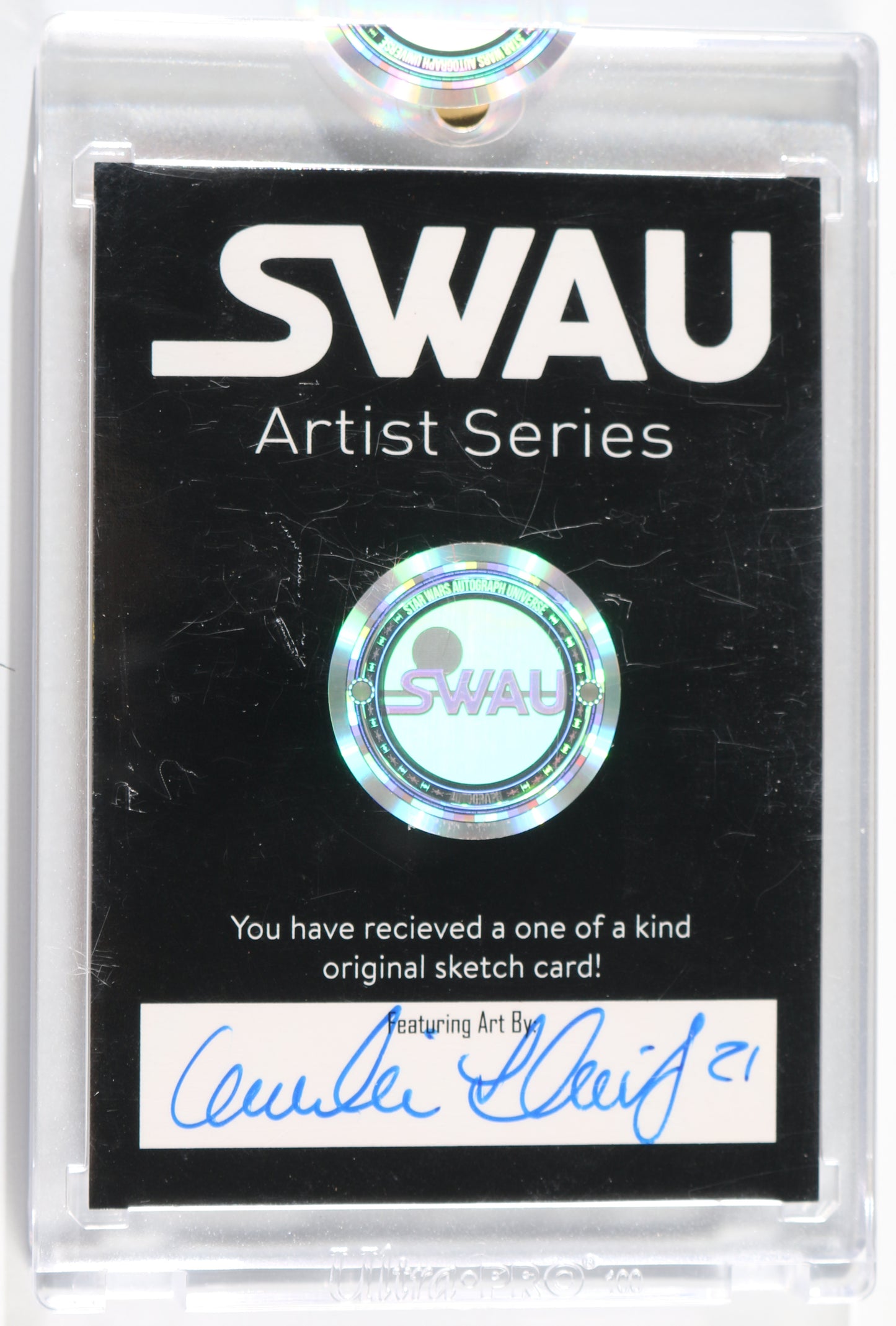 
                  
                    Rosario Dawson as Ahsoka Tano in Star Wars: The Mandalorian (Encapsulated) Signed SWAU Artist Series Trading Card by Candice Dailey
                  
                