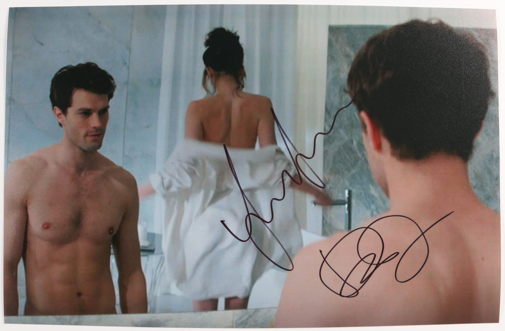 Jamie Dornan as Christian Grey & Dakota Johnson as Anastasia Steele in Fifty Shades of Grey Signed 11x17 Photo