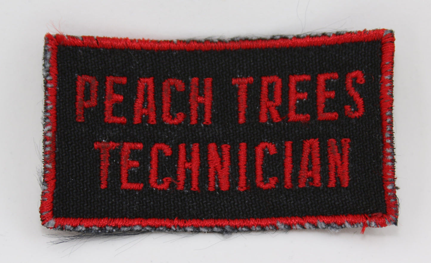 
                  
                    Dredd Production Used Peach Trees Technician Movie Wardrobe Patch - 2012
                  
                