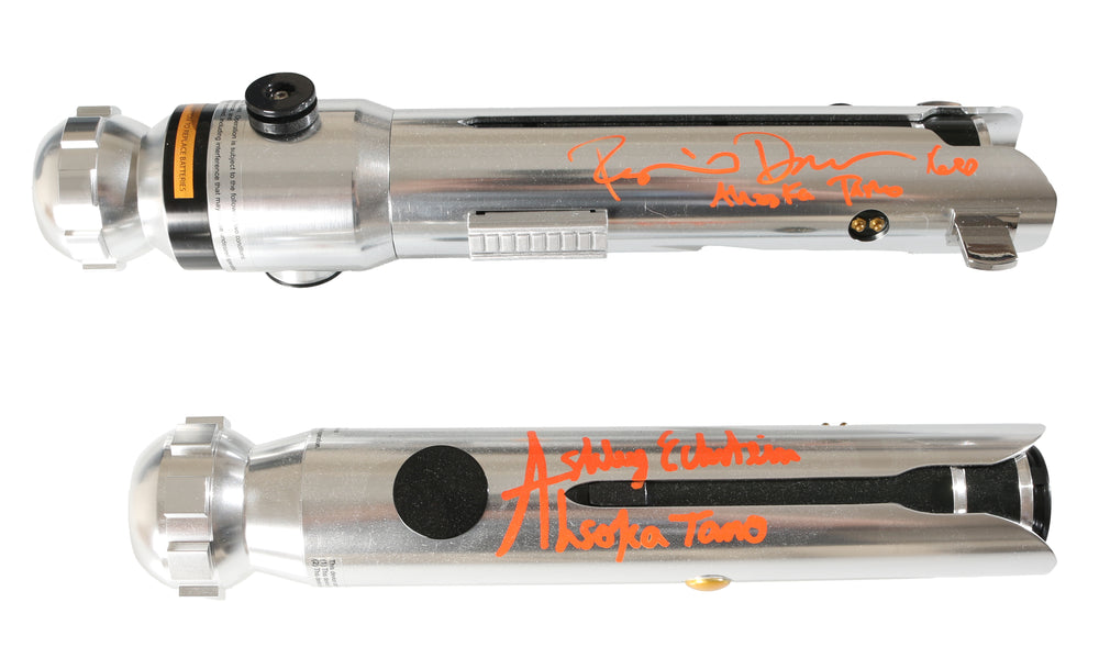 
                  
                    Ahsoka Tano from Star Wars: Rebels & the Mandalorian Disney Galaxy's Edge Prop Replica Legacy Lightsaber Signed by Ashley Eckstein & Rosario Dawson with Lightsaber Blade Signed by Matthew Wood with Character Names & Quote SET
                  
                