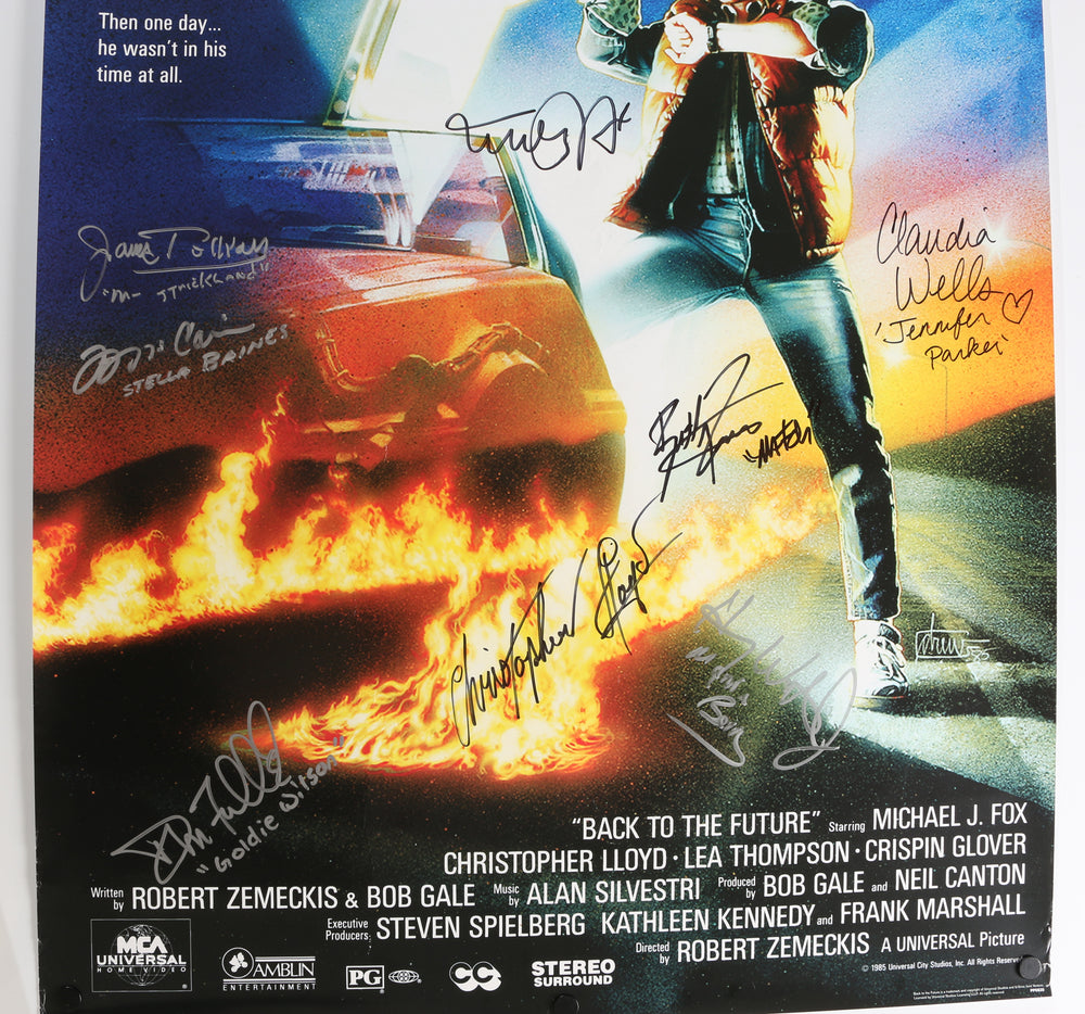 
                  
                    Back to the Future Reproduction 24x36 Poster Cast Signed by Michael J. Fox, Christopher Lloyd, Claudia Wells, Don Fullilove, Frances Lee McCain, Billy Zane, James Tolkan, and Harry Waters Jr .
                  
                