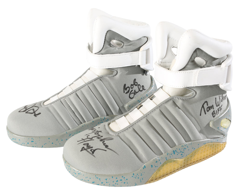 
                  
                    Back to the Future Part II Prop Replica Electronic Light Up Nike Sneakers (Celebrity Authentics) Cast Signed by Michael J Fox, Christopher Lloyd, Lea Thompson, Tom Wilson, & Bob Gale with Character Names
                  
                