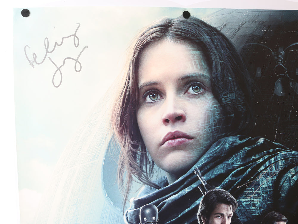 
                  
                    Diego Luna as Cassian Andor & Felicity Jones as Jyn Erso in Rogue One: A Star Wars Story (SWAU) Signed 27x40 Poster
                  
                