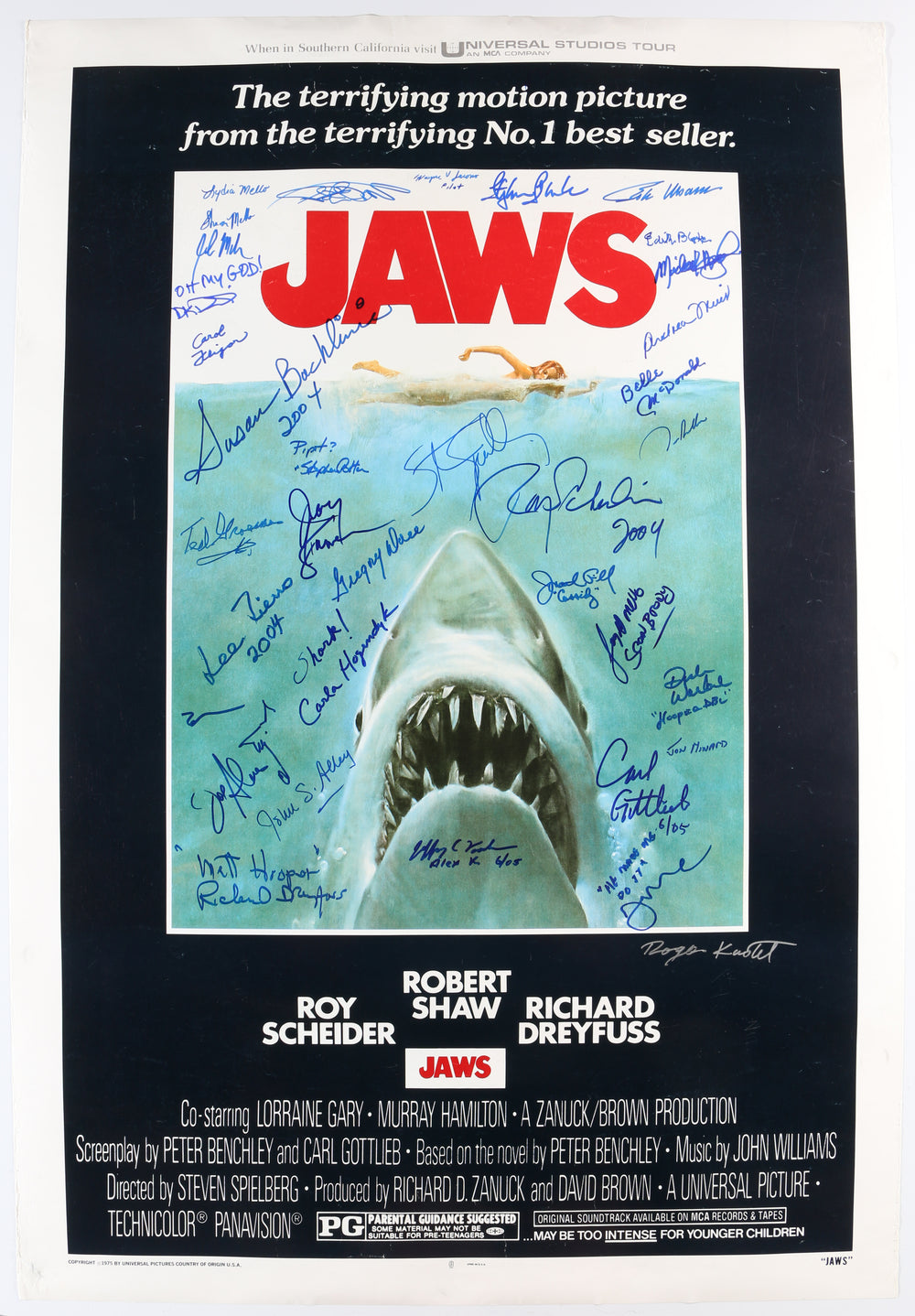 Jaws (K9) 27x40 Poste Cast Signed by Steven Spielberg, Roy Scheider, Richard Dreyfuss, Carl Gottlieb, Jeffrey Kramer, Lee Fierro, Roger Kastel, Jonathan Filley, Jay Mello, Stephen Potter, Belle McDonald, Dick Warlock, Michael Haydn, Carol Fligor, & More