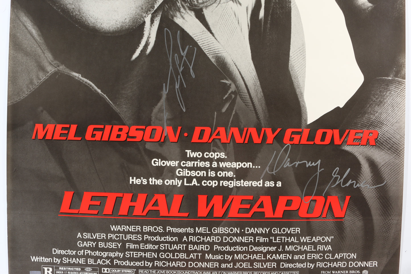
                  
                    Mel Gibson as Martin Riggs & Danny Glover as Roger Murtaugh in Lethal Weapon (Celebrity Authentics) Signed 27x40 Poster
                  
                