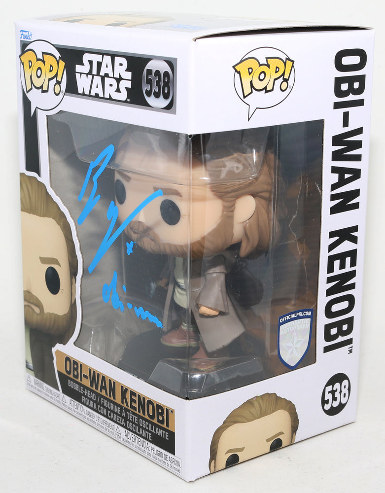 
                  
                    Ewan McGregor as Obi-Wan Kenobi in Star Wars (Official Pix) Signed Funko POP! #538 with Character Name
                  
                