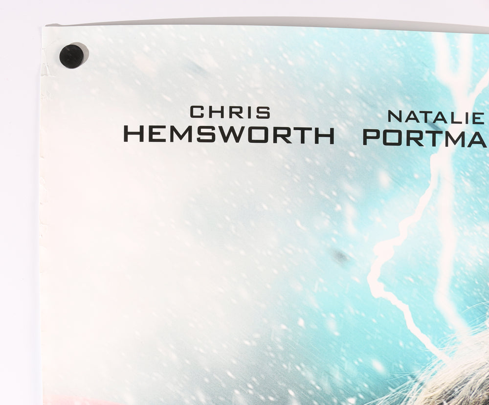 
                  
                    Chris Hemsworth as Thor in Thor: The Dark World Signed 27x40 Poster with Character Name
                  
                