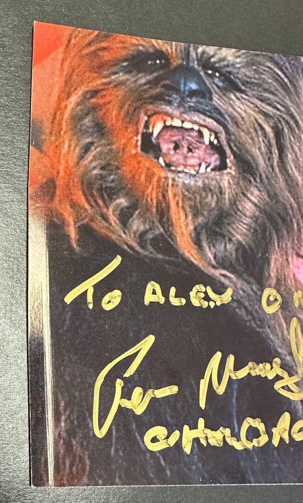 
                  
                    Carrie Fisher as Princess Leia & Peter Mayhew as Chewbacca in Star Wars: The Empire Strikes Back Signed 5x7 Photo with Rare Mayhew Quote
                  
                