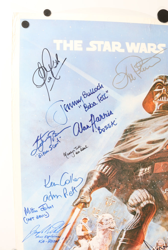 
                  
                    Star Wars: The Empire Strikes Back 26x40 Poster Signed by Harrison Ford, Carrie Fisher, Mark Hamill, Bob Anderson, Dave Prowse, Peter Mayhew, Kenny Baker, Billy Dee Williams, Anthony Daniels, Jeremy Bulloch, Irvin Kershner, & More
                  
                