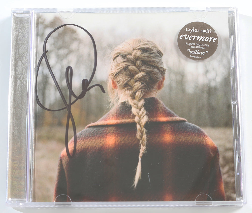 
                  
                    Evermore CD Album with Cover Signed by Taylor Swift
                  
                