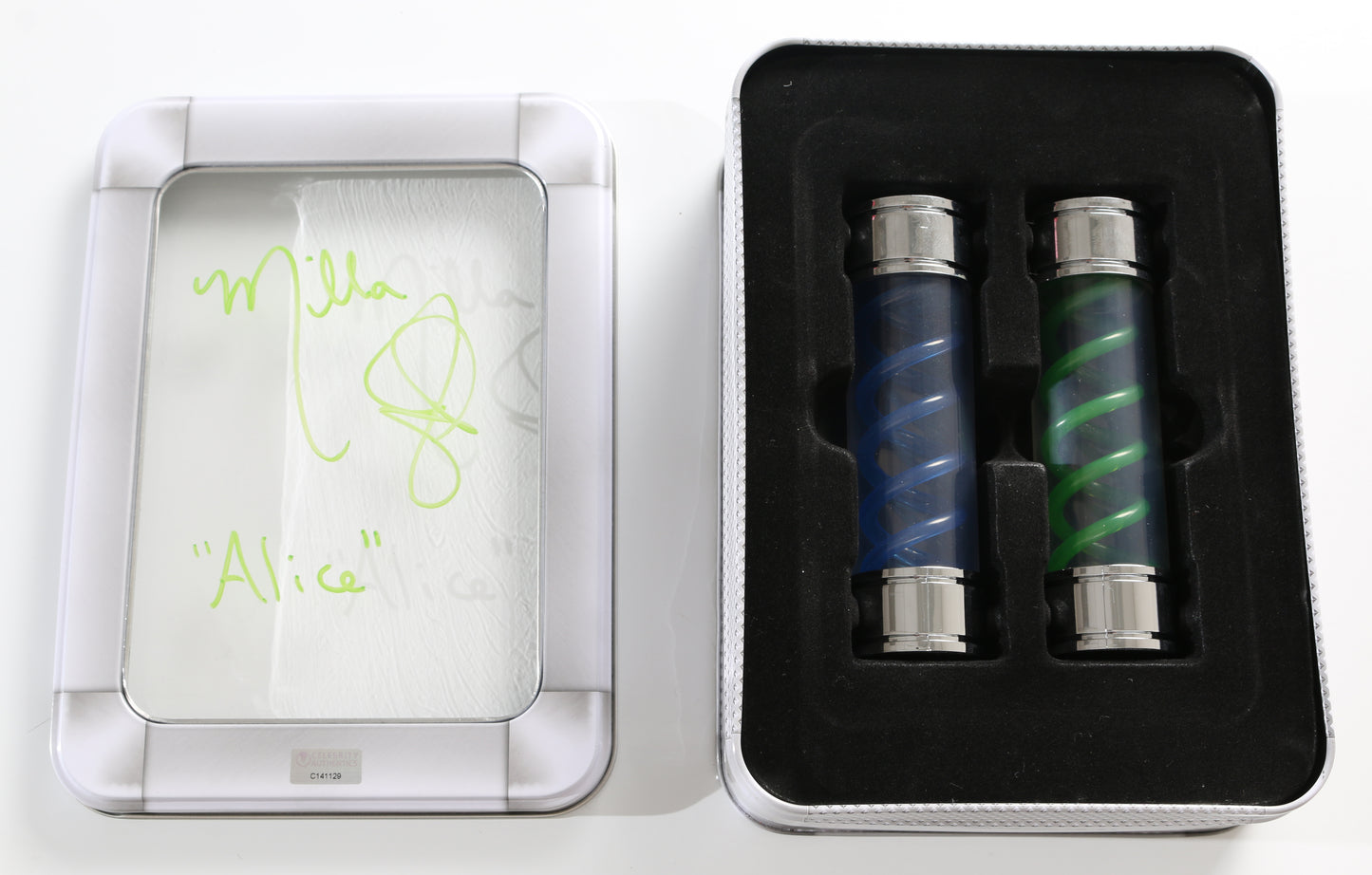 
                  
                    Milla Jovovich as Alice in Resident Evil T-Virus & G-Vaccine Prop Replica Set in Case (Celebrity Authentics ) Signed with Character Name
                  
                