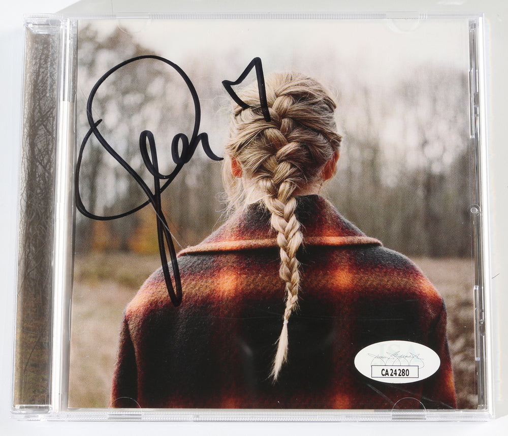 Evermore (JSA) CD Album Insert Signed by Taylor Swift