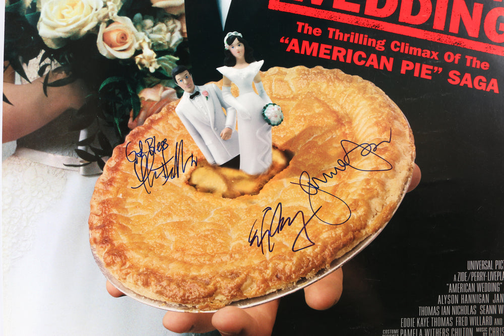 
                  
                    American Wedding 27x40 Poster Cast Signed by Jason Biggs, Alyson Hannigan, Seann William Scott, Eddie Kaye Thomas, Eugene Levy, Thomas Ian Nicholas, & January Jones
                  
                