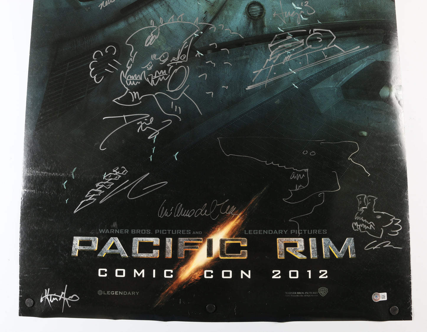 
                  
                    Pacific Rim 27x39.5 Poster Cast Signed by Director Guillermo Del Toro with Sketch Art, Hugo Martin, David Meng, Charlie Hunnam, Ron Perlman, Robin Thomas, John Giang, Guy Davis, John Rosengrant, Trevor Hensley, Nelson Hall, & Kevin Kutchaver
                  
                