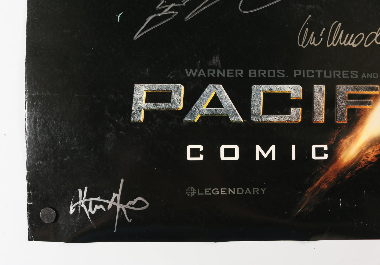 
                  
                    Pacific Rim 27x39.5 Poster Cast Signed by Director Guillermo Del Toro with Sketch Art, Hugo Martin, David Meng, Charlie Hunnam, Ron Perlman, Robin Thomas, John Giang, Guy Davis, John Rosengrant, Trevor Hensley, Nelson Hall, & Kevin Kutchaver
                  
                