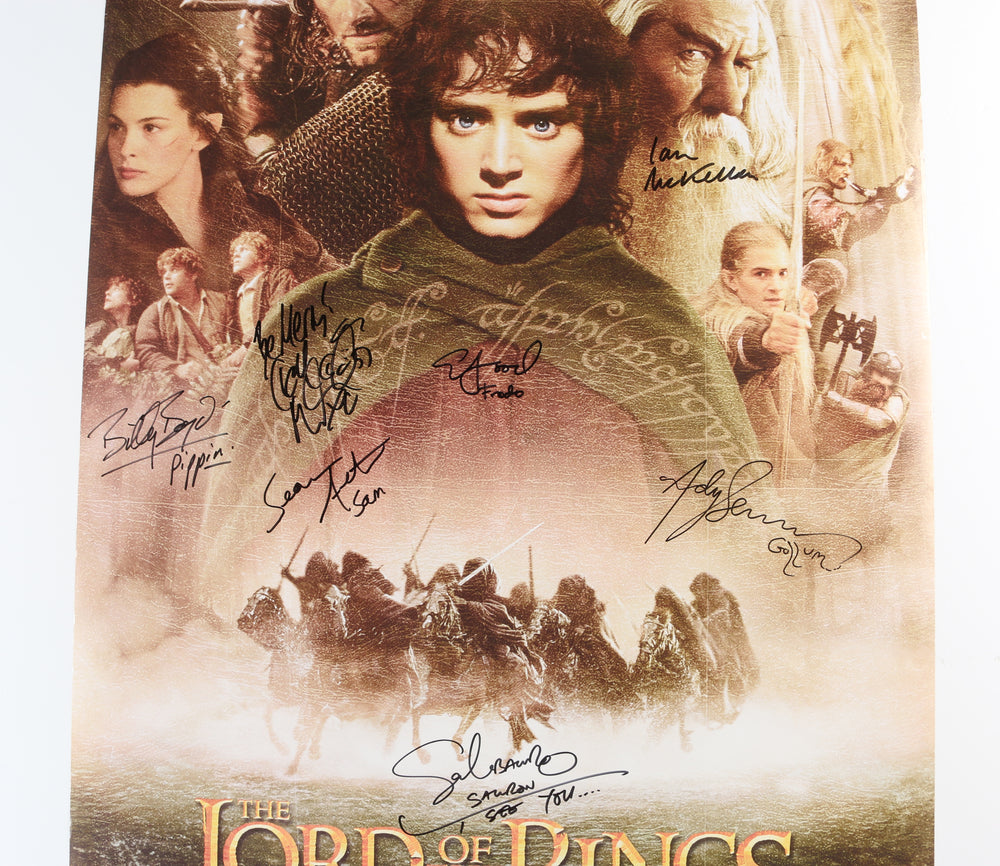 
                  
                    The Lord of the Rings: The Fellowship of the Ring (JSA) 24x36 Poster Cast Signed by Ian McKellen, Elijah Wood, Sean Astin, Billy Boyd, Dominic Monaghan, Andy Serkis, & Sala Baker with Character Names
                  
                