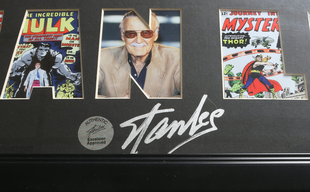 
                  
                    Stan Lee Creator of Marvel Characters: Spider-Man, the X-Men, Iron Man, Thor, the Hulk, Ant-Man, the Wasp, the Fantastic Four, Black Panther, Daredevil, Doctor Strange, the Scarlet Witch, Black Widow, & Many More Signed Custom Matting in 26" x 9" Frame
                  
                