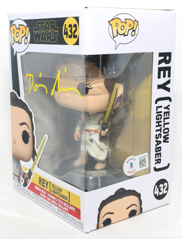 
                  
                    Daisy Ridley as Rey with Yellow Lightsaber in Star Wars: The Rise of Skywalker (Beckett Witnessed) Signed Funko POP! #432
                  
                