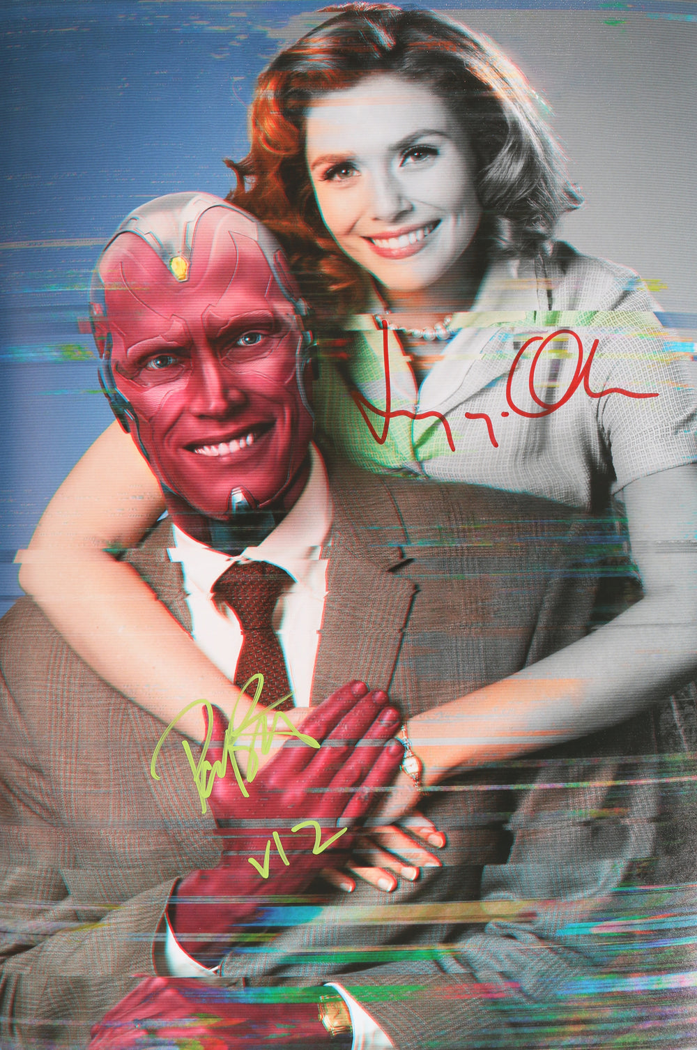 Elizabeth Olsen as Wanda and Paul Bettany as Vision in WandaVision Signed 12x18 Photo with Character Name