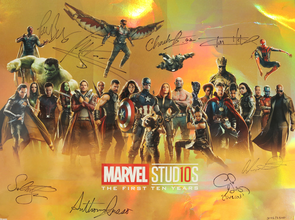 
                  
                    Marvel Studios: The First Ten Years 18.5x27 Limited Edition #3145/3500 El Capitan Theater Poster Cast Signed by Tom Holland, Sebastian Stan, Paul Bettany, Michael Rooker, Clark Gregg, Directors: Joe & Anthony Russo, & Chadwick Boseman
                  
                