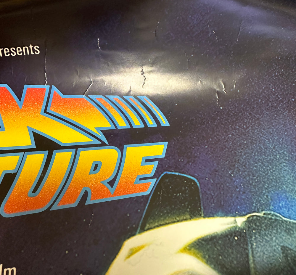 
                  
                    Back to the Future Reproduction 24x36 Poster Cast Signed by Michael J. Fox, Christopher Lloyd, Claudia Wells, Don Fullilove, Frances Lee McCain, Billy Zane, James Tolkan, and Harry Waters Jr .
                  
                