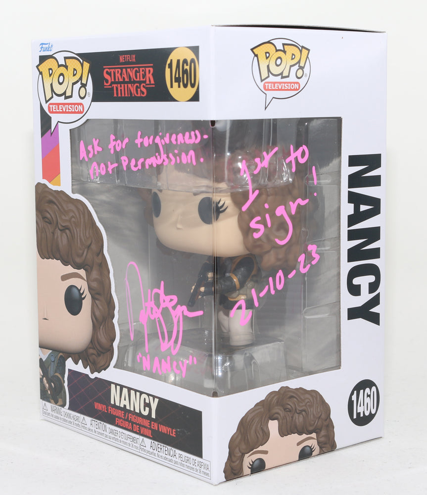 
                  
                    Natalia Dyer as Nancy Wheeler in Stranger Things (SWAU) Signed Funko POP! #1460 with Character Name & Quote
                  
                