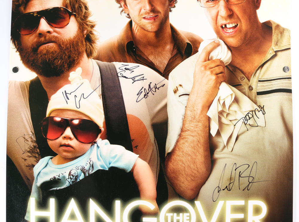 
                  
                    The Hangover 27x40 Poster Cast Signed by Bradley Cooper, Zach Galifianakis, Ed Helms, Justin Bartha, Heather Graham, & Director: Todd Phillips
                  
                