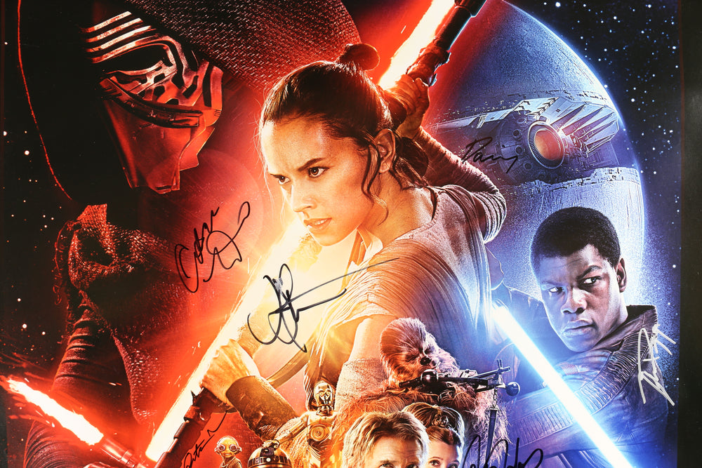 
                  
                    Star Wars: The Force Awakens 27x40 Poster Cast Signed by Harrison Ford, Carrie Fisher, Daisy Ridley, John Boyega, Oscar Isaac, Lupita Nyongo, Adam Driver, Gwendoline Christie, & Director: J.J. Abrams
                  
                