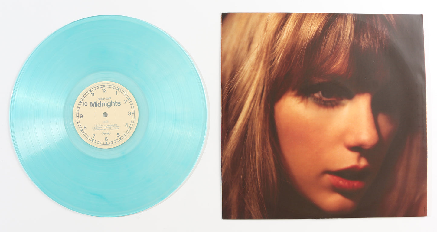 
                  
                    Midnights Moonstone Blue Edition LP 12" Vinyl with Insert (JSA) Signed by Taylor Swift
                  
                