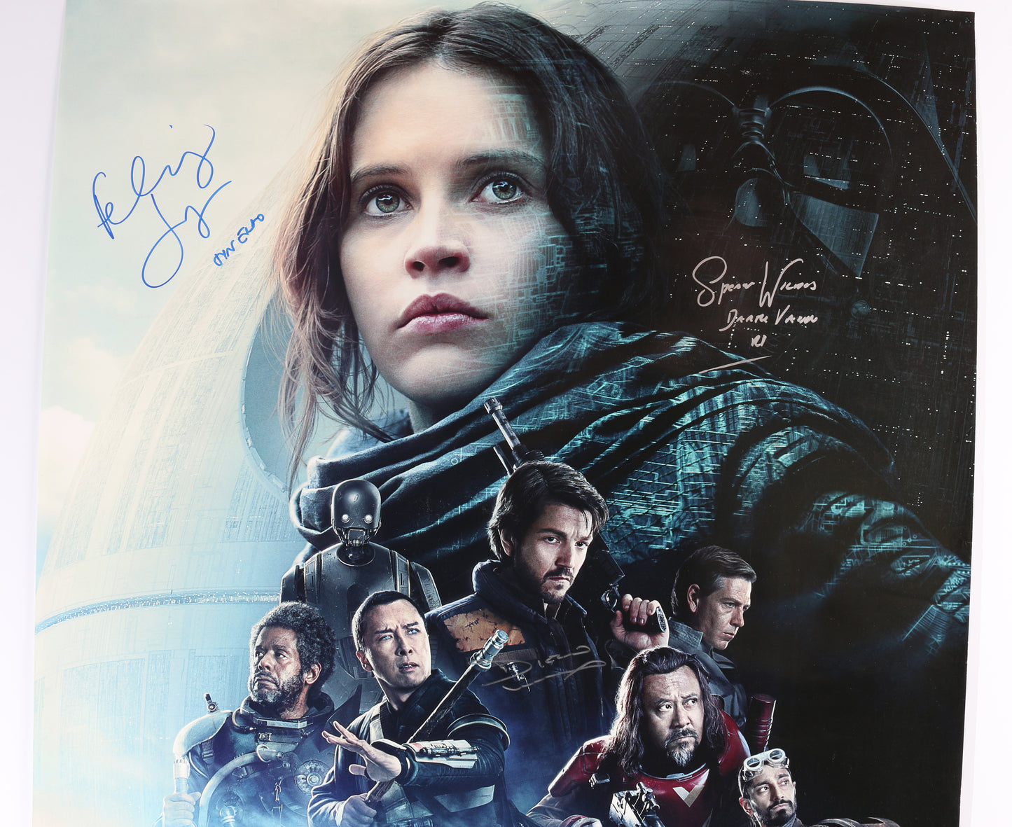 
                  
                    Felicity Jones as Jyn Erso, Diego Luna as Cassian Andor, & Spencer Wilding as Darth Vader in Rogue One: A Star Wars Story Signed 27x40 Poster with Character Names
                  
                