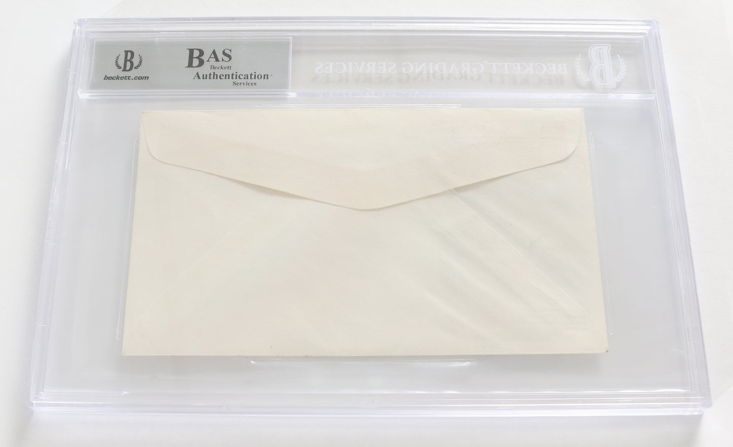 
                  
                    John Williams Composer Signed 6.5x3.5 First Day of Issue Envelope of Devil's Tower (Beckett Slabbed) with Rare AMQS Handwritten Musical Notes of the Close Encounters of the Third Kind Theme
                  
                